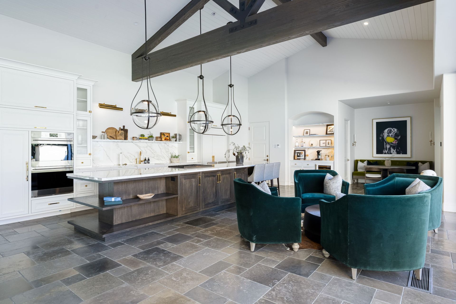 a large kitchen with wooden cabinets and stainless steel appliances