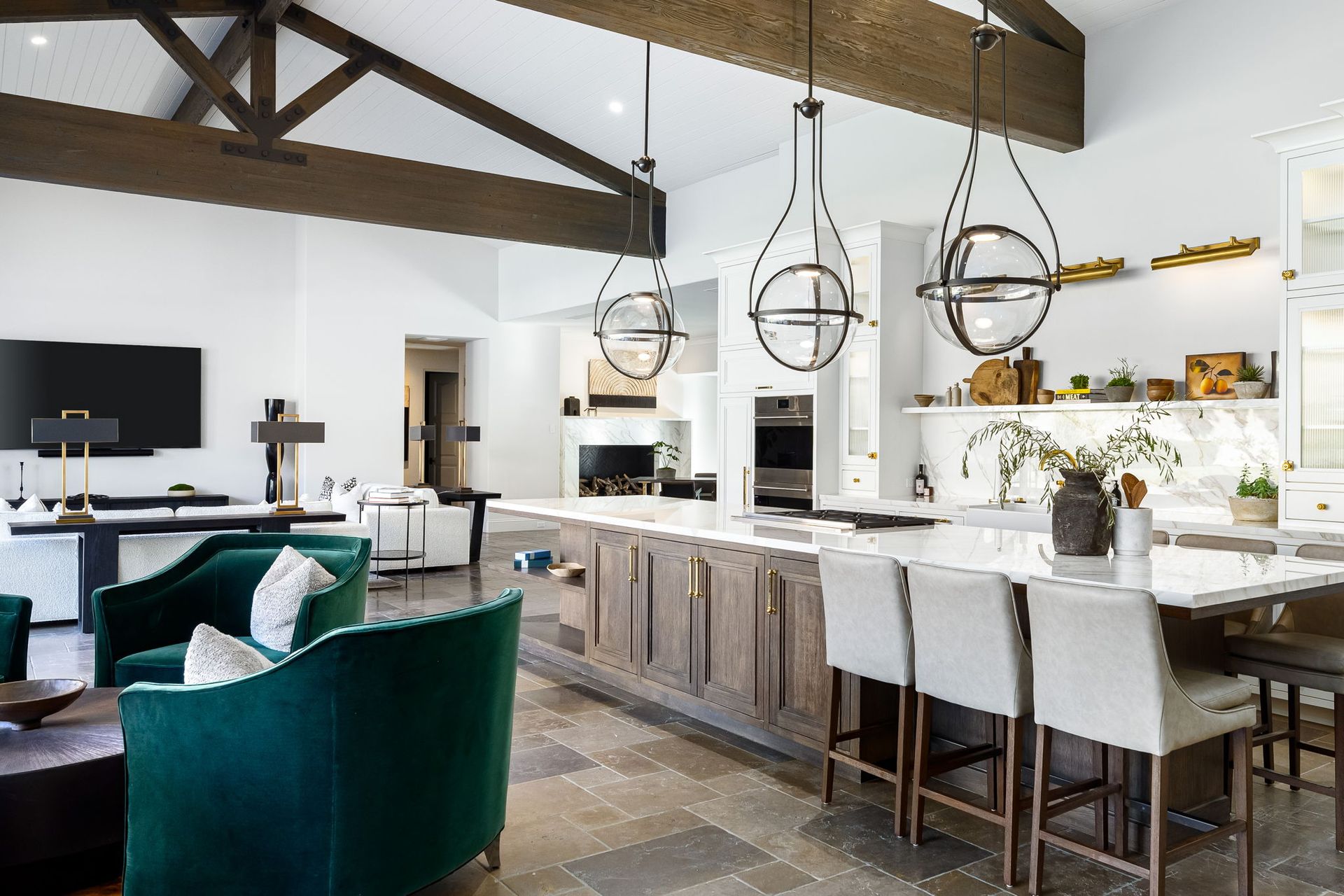 a kitchen with a large island and wooden cabinets