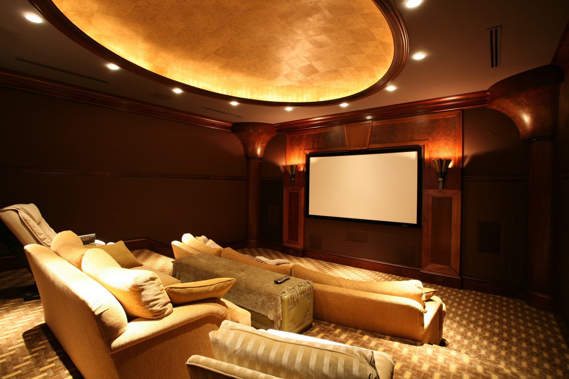 a home theater with a large flat screen tv