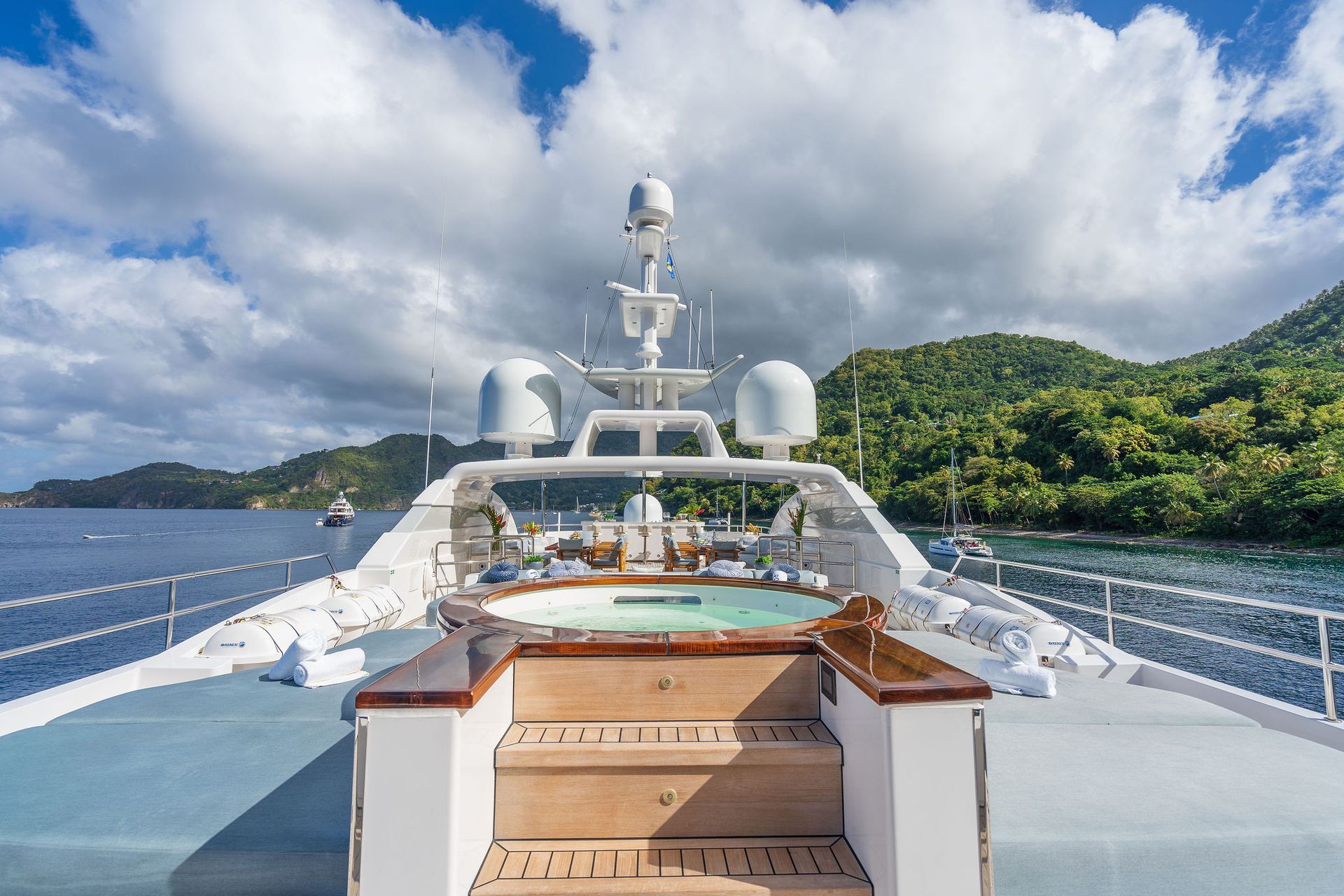 the front of a large yacht with a hot tub on the deck
