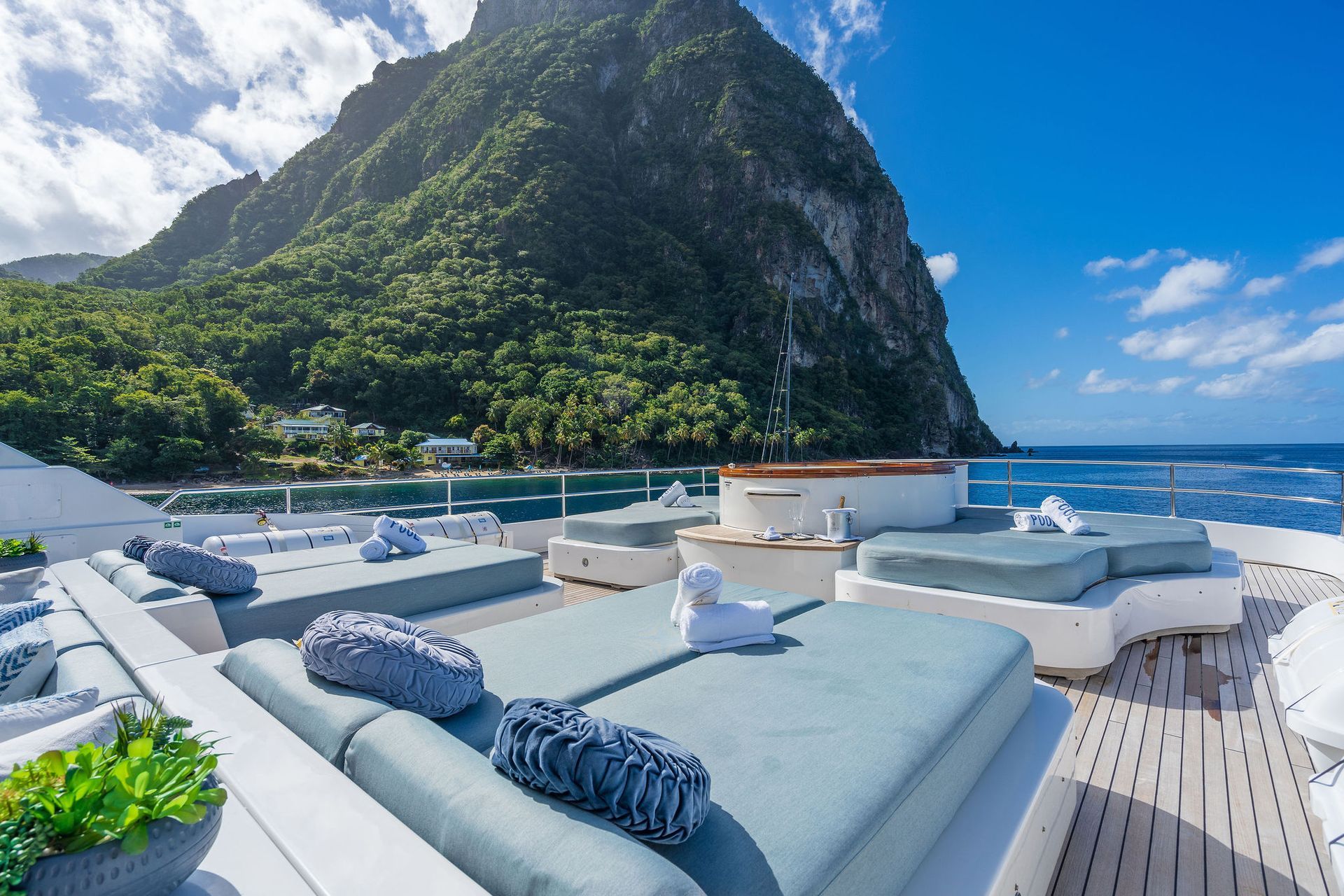 there are a lot of beds on the deck of a yacht