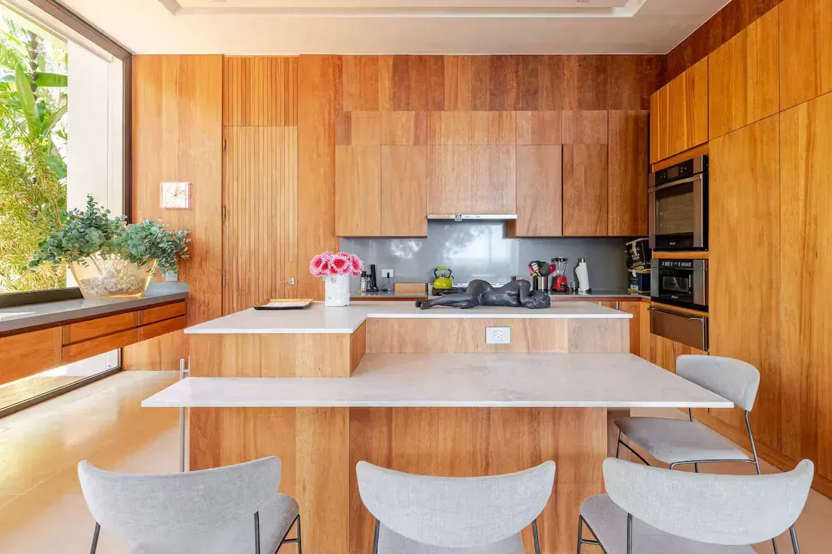 a kitchen with stainless steel appliances and granite counter tops