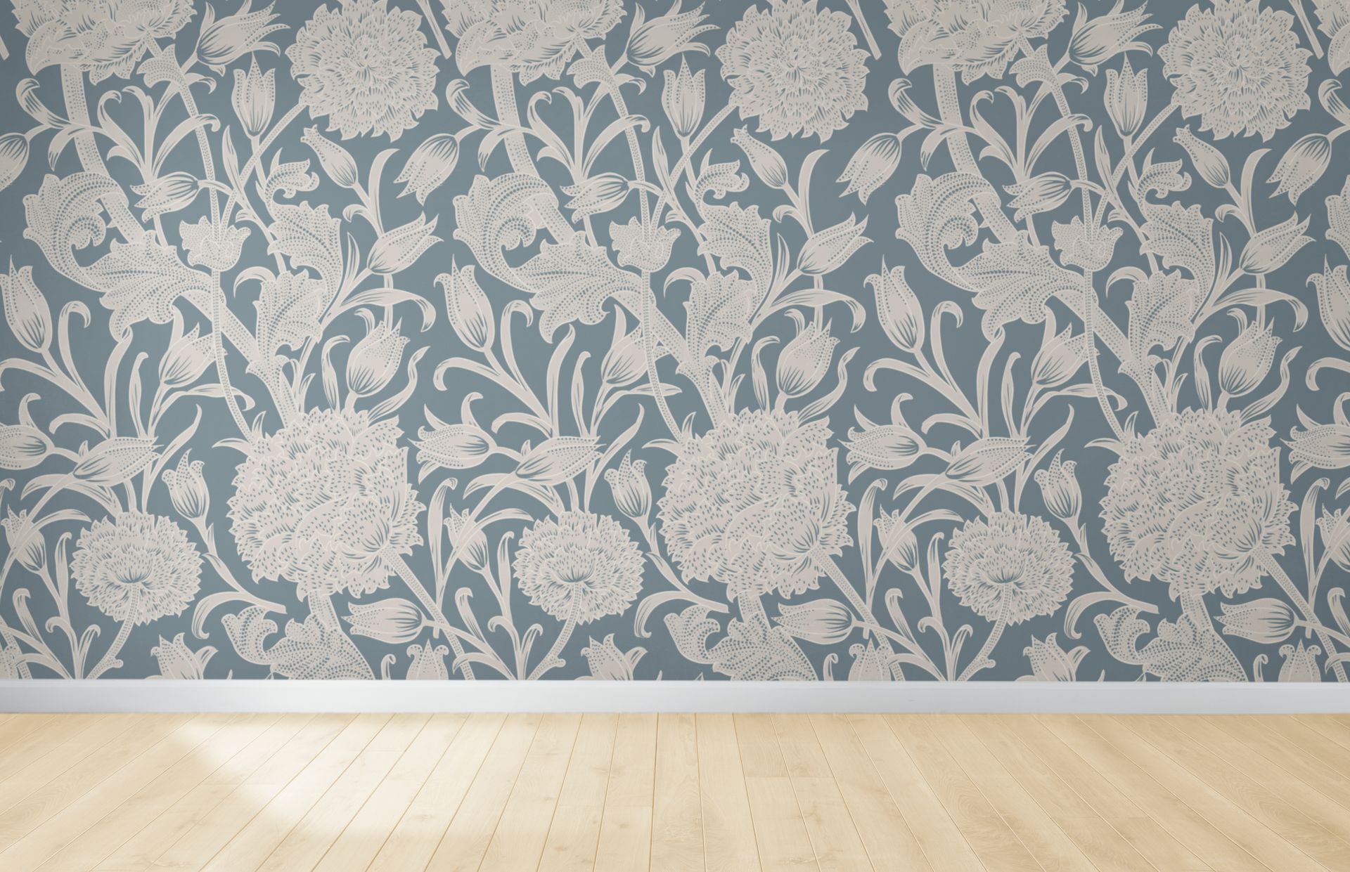 An empty room with a floral wallpaper on the wall
