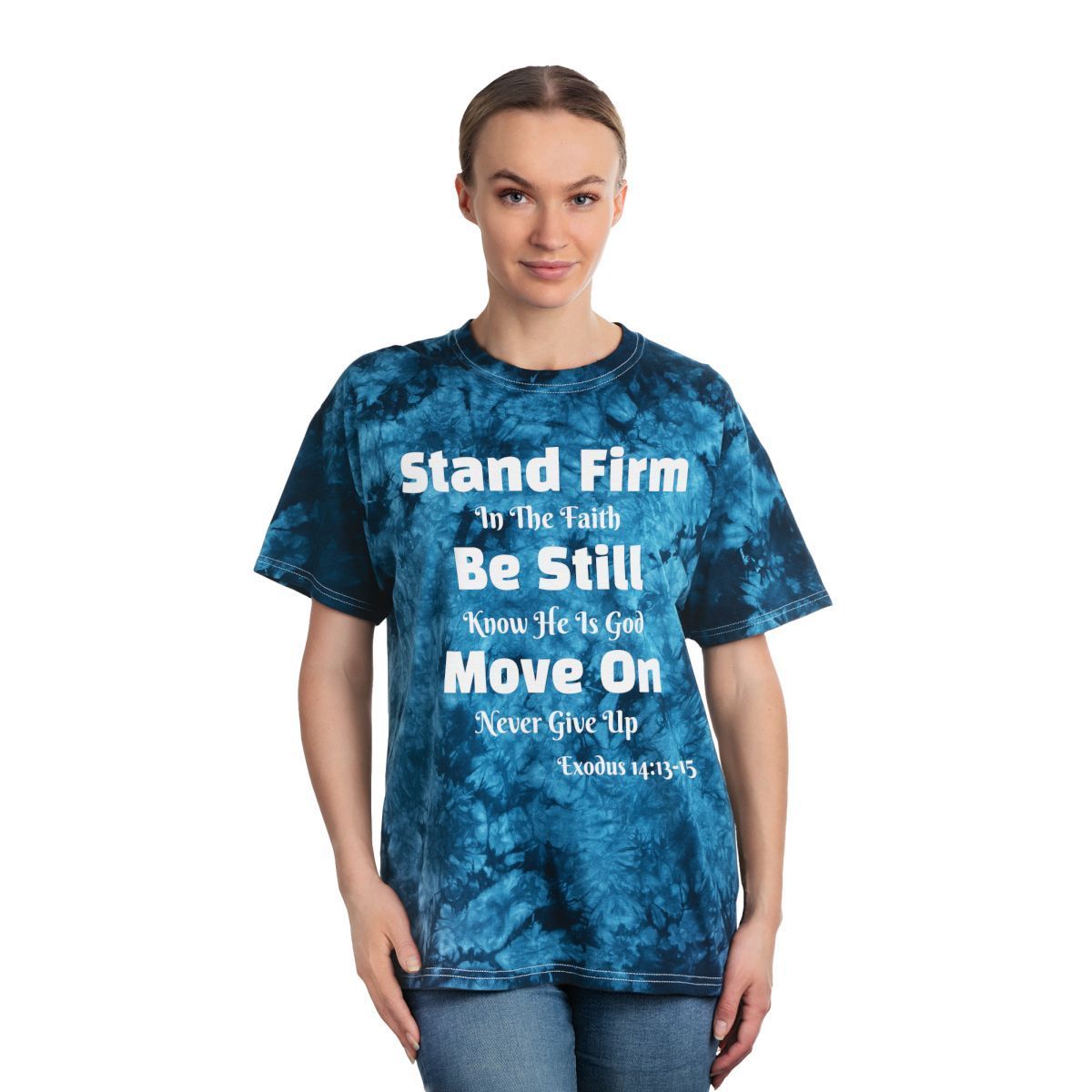 Woman wearing a blue tie-dye t-shirt with Christian text.