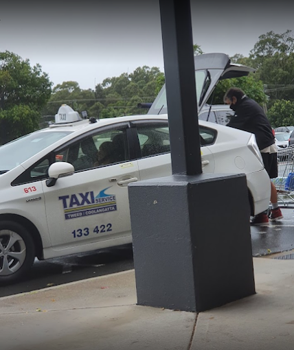 A White Taxi With the Number 133 422 on the Side — Tweed Heads Coolangatta Taxi Service In Tweed Heads, NSW