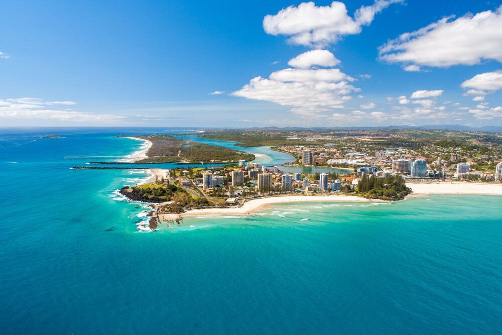An Aerial View of a City on a Island in the Middle of the Ocean — Tweed Heads Coolangatta Taxi Service In Coolangatta, QLD
