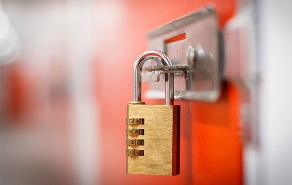 Self-storage — Gold Padlock with Code to Secure Storage in Davie, FL
