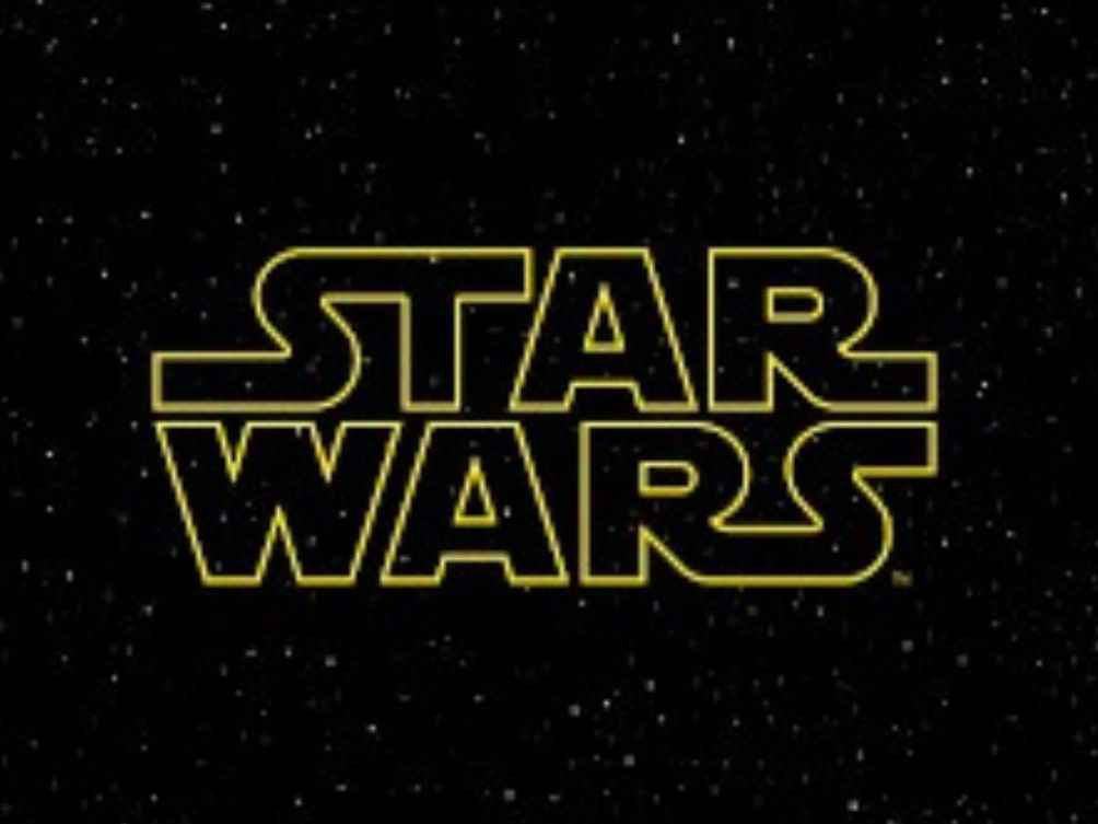 Yellow "Star Wars" logo on a starry black background.