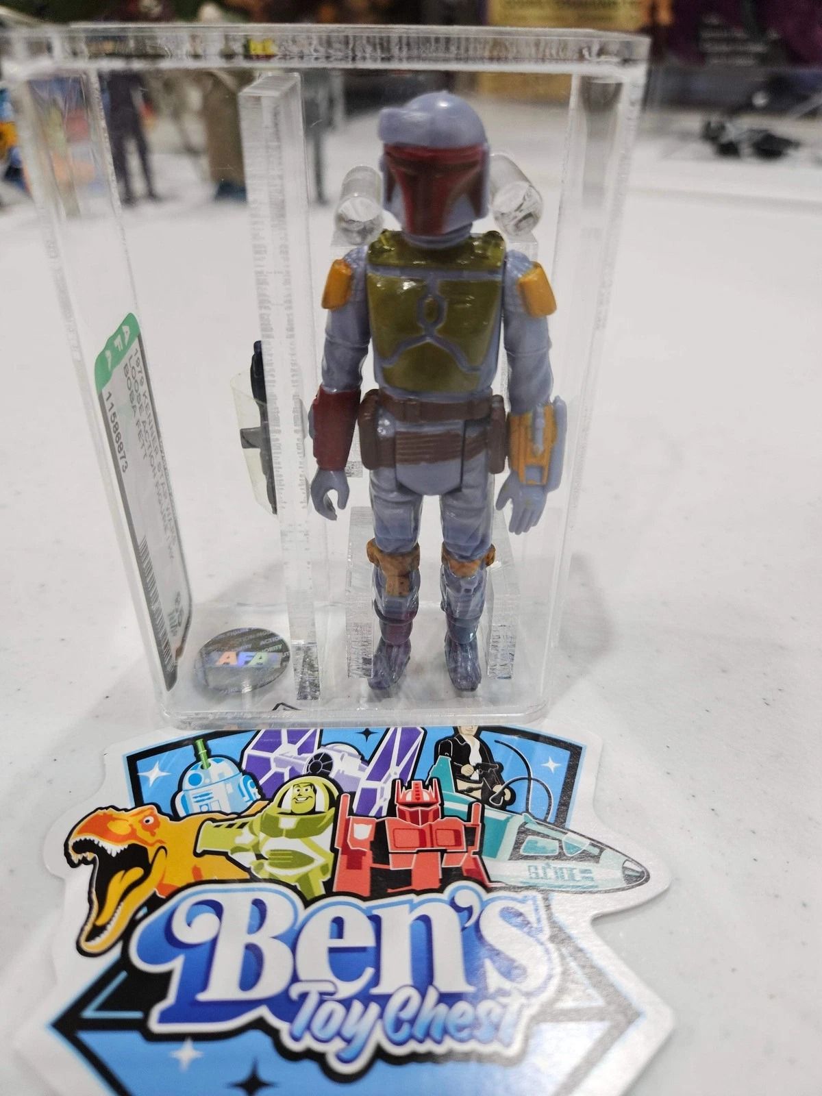 Boba Fett action figure in a clear case, with a