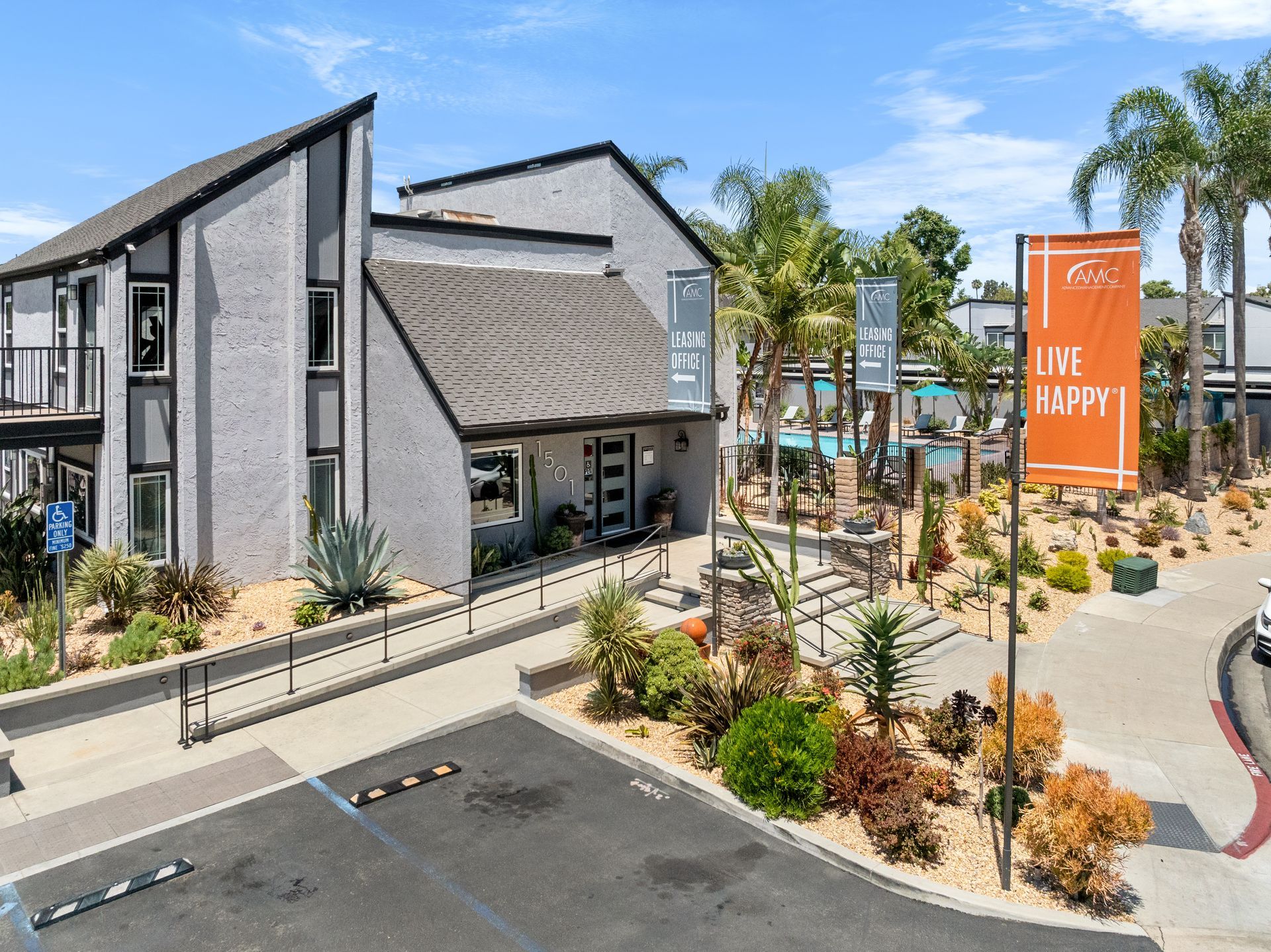 exterior leasing office with flags