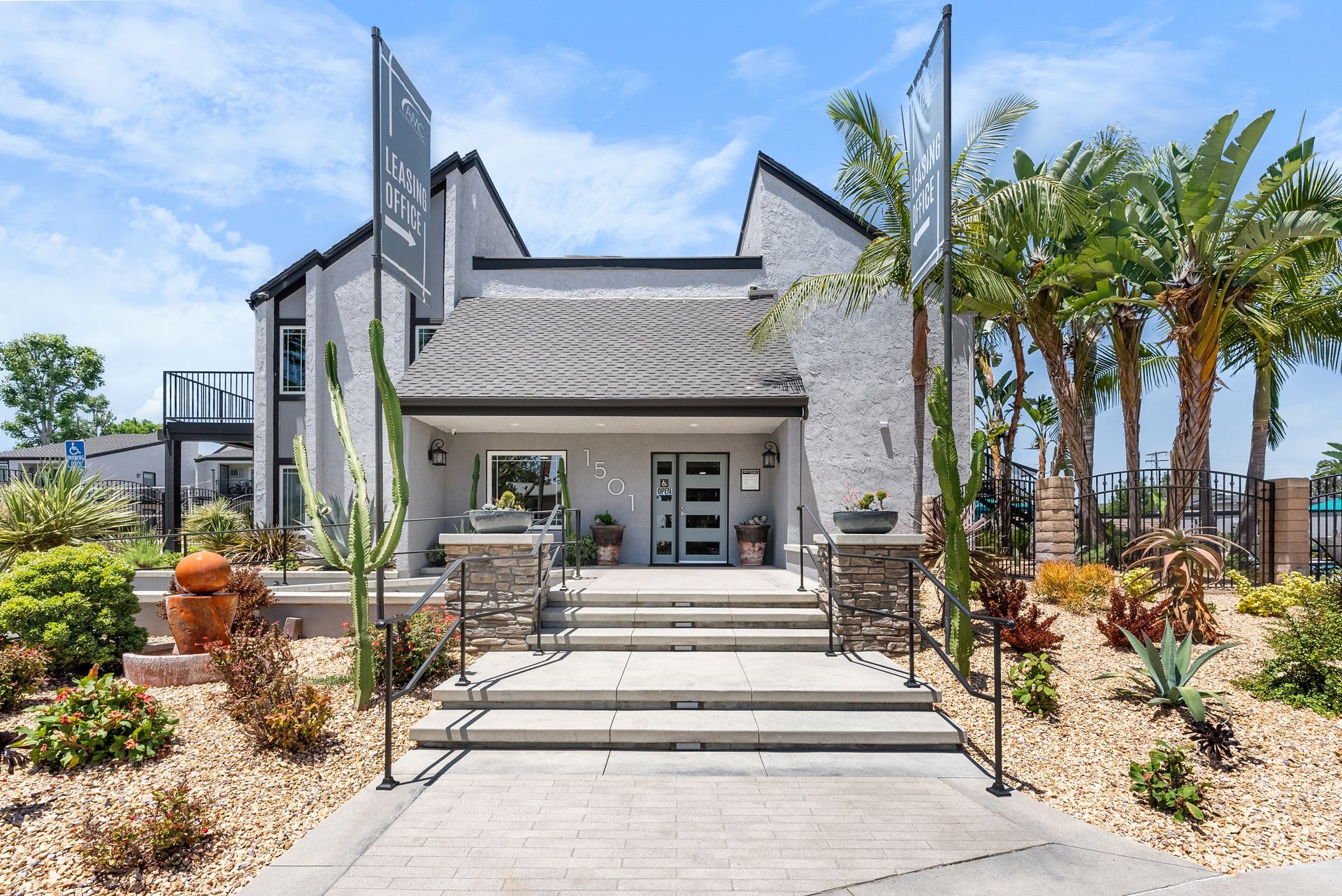 leasing office exterior with flags