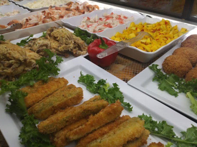 baked fish with white sauce and red sauce