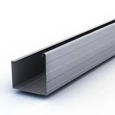 A dark gray roof with metal trim and a gutter. Metal bars run across the roof's surface.