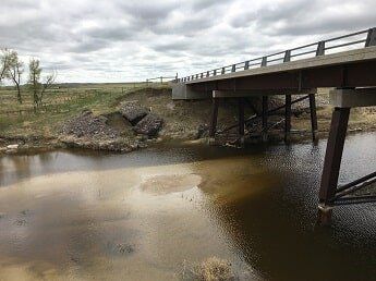 flooded road - commercial construction in WY