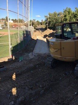 tractor pushes dirt - municipal construction in WY