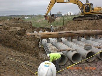 installing drain pipes - construction in WY