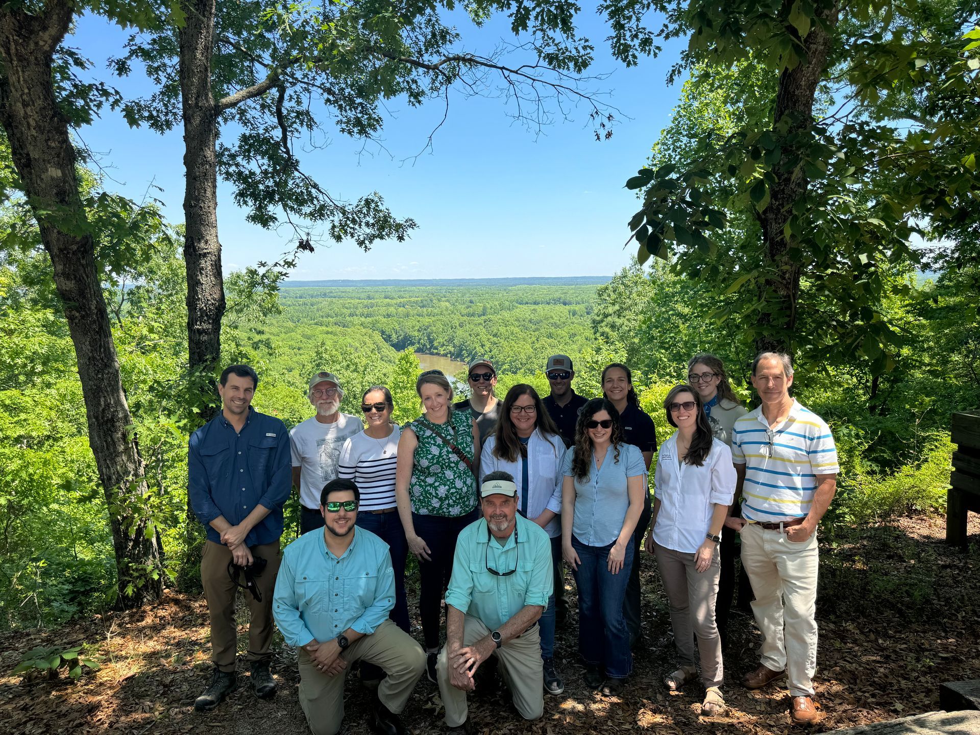 Members of the SCLTN gather for a photo while enjoying one of the many protected lands in the network.