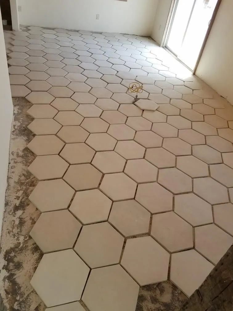 A room with hexagonal tiles on the floor