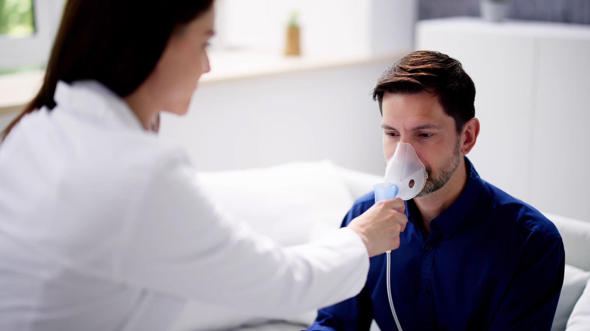 A man receiving Nasal Ozone Therapy.