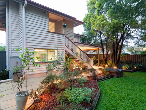 An investment property with a beautifully landscaped backyard
