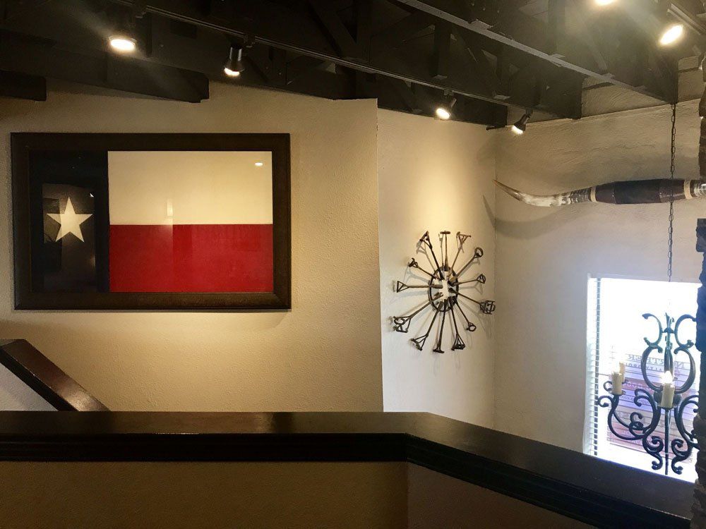 Wall with Hanging Arts — Grapevine, TX — Lone Star Executive Suites