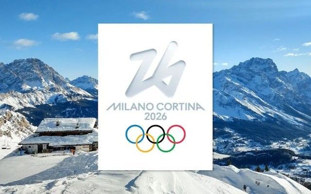 Milan-Cortina 2026 Olympics logo on a snowy mountain landscape, with the Olympic rings in the foreground.