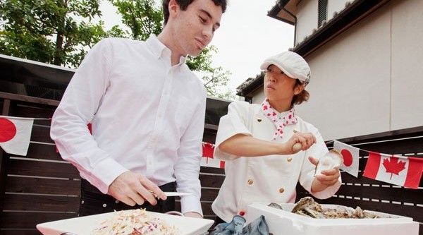 Catering staff from Shooters on location preparing oysters.