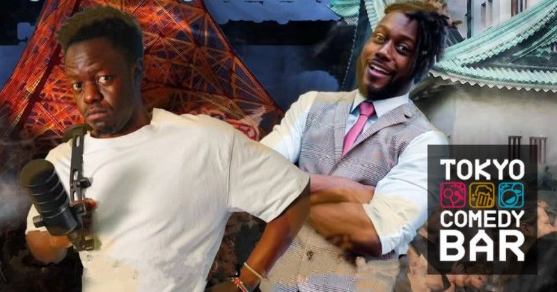 Two men posing with guns in front of a Tokyo Comedy Bar sign and Japanese-style background