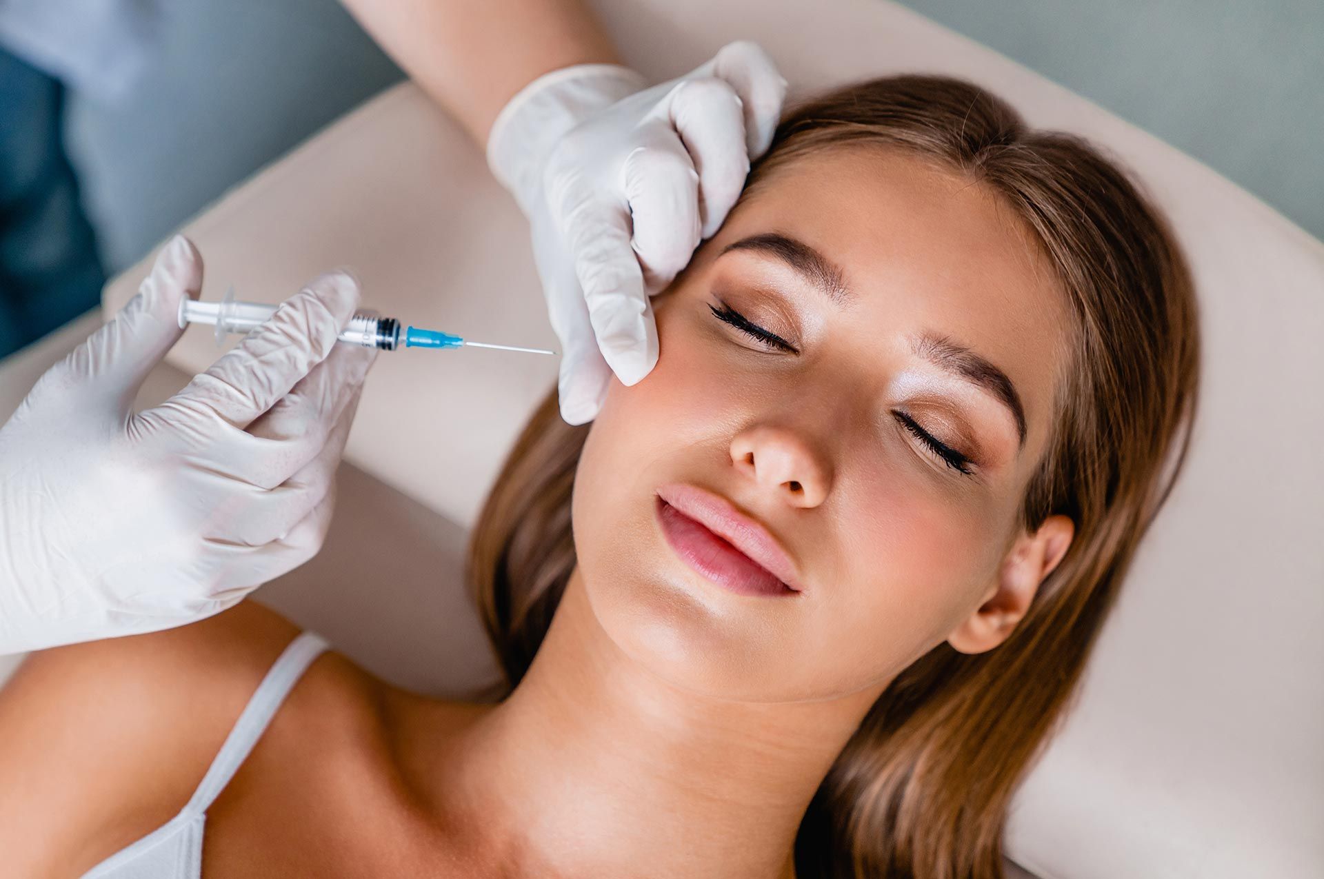 A woman is getting Botox. A woman is getting Botox.