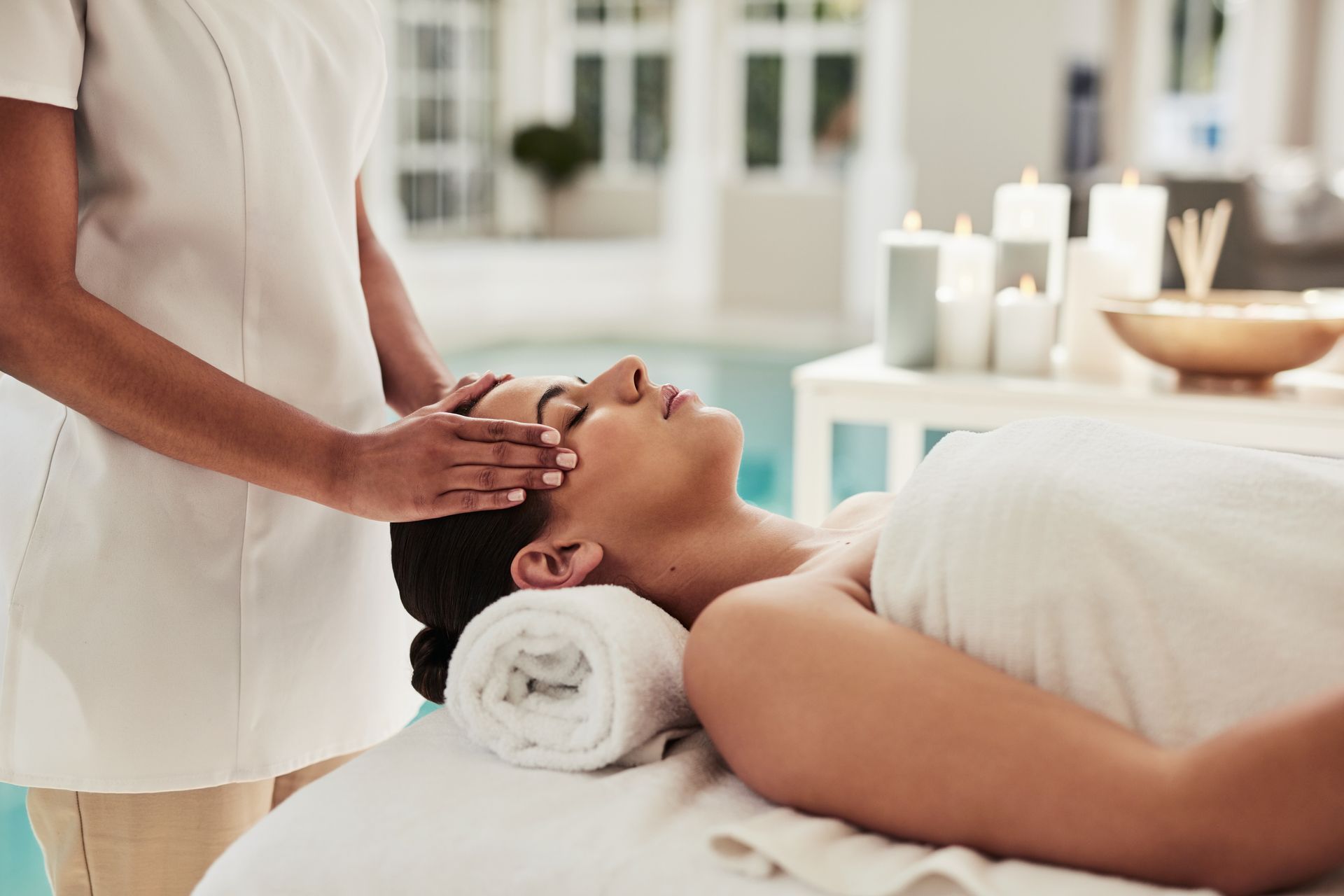 Woman relaxing at a med spa during aromatherapy and holistic massage treatment. Woman relaxing at a med spa during aromatherapy and holistic massage treatment.