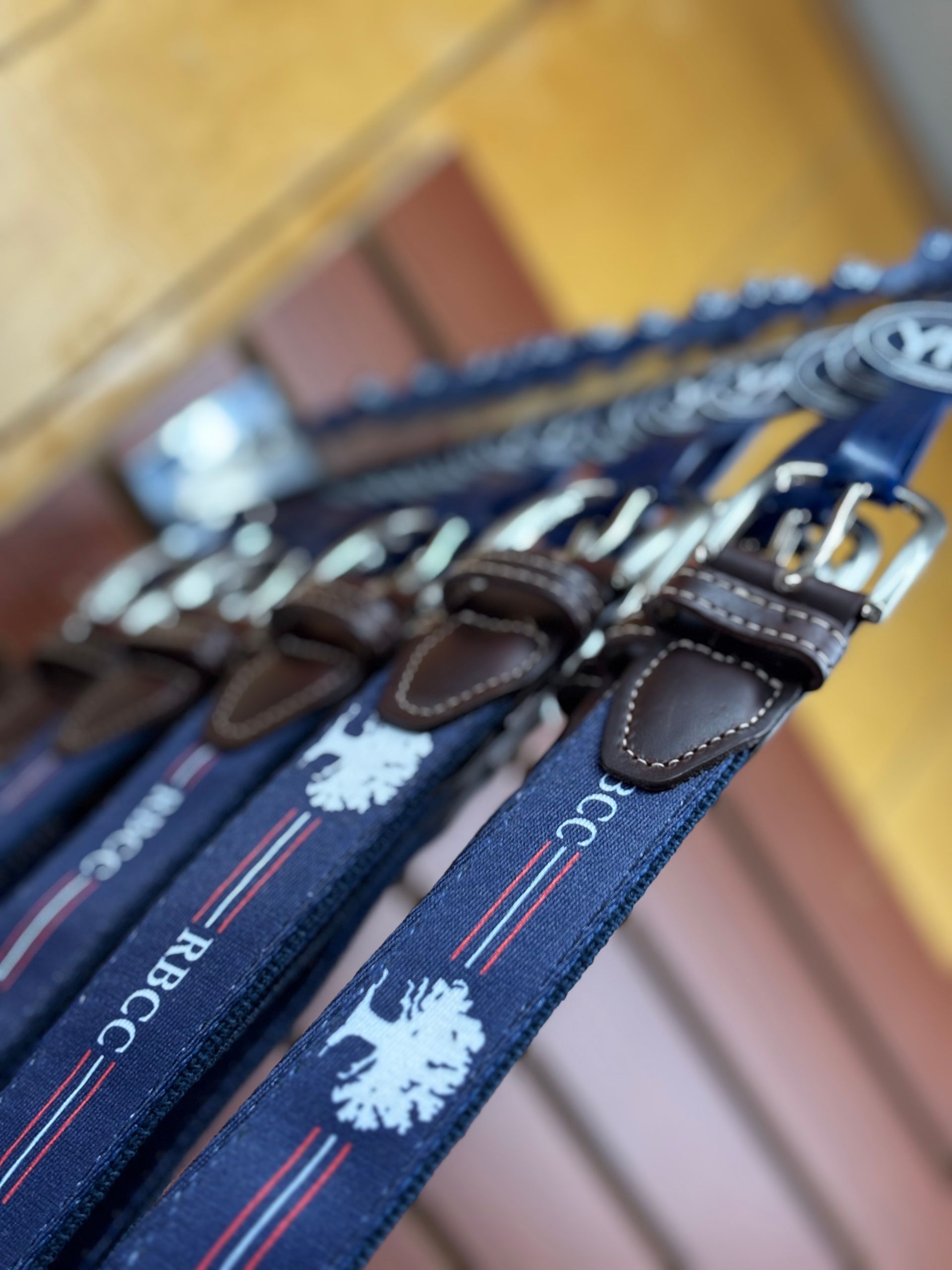 A man wearing a hat and a shirt that says river on it