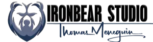 Logo: Ironbear Studio with a bear emblem and signature of Thomas Menequin.