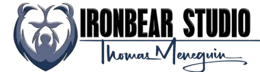 Logo: Ironbear Studio with a bear emblem and signature of Thomas Menequin.
