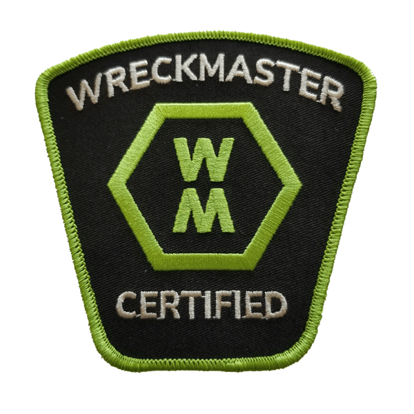 WreckMaster Certified patch, black with green accents. Hexagon with