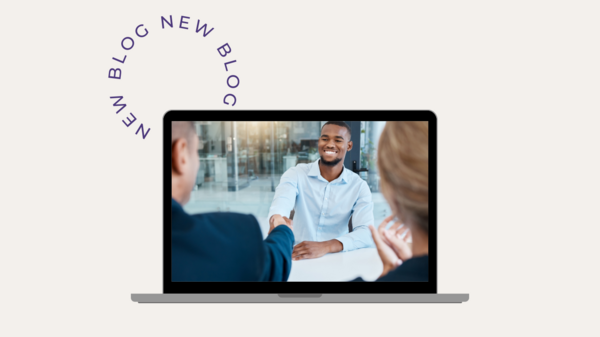 A group of people are shaking hands on a laptop screen.