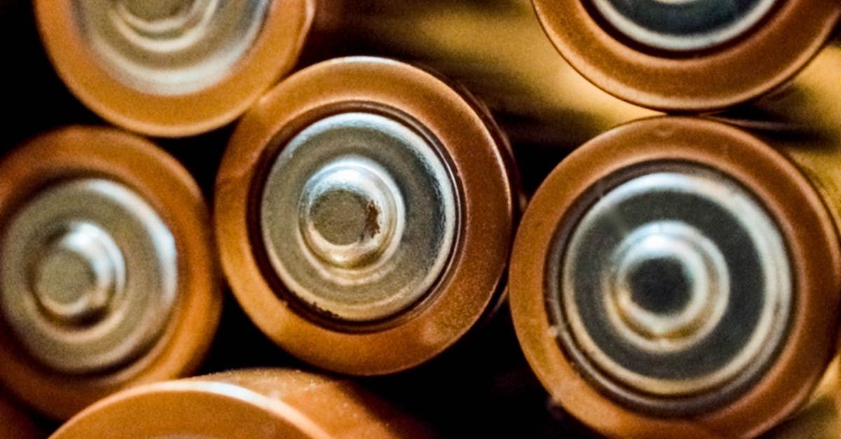 A bunch of batteries are stacked on top of each other.