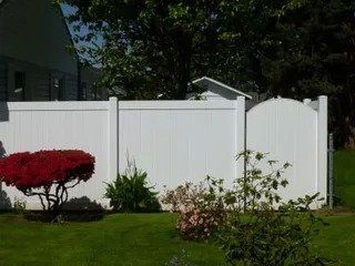White vinyl fence in yard - Vancouver, WA - DJ Fence Service