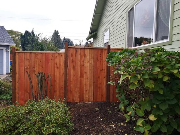 Newly installed wood fence beside the house - Vancouver, WA - DJ Fence Service