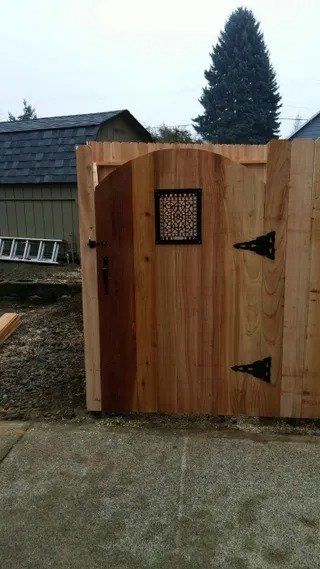 Ornamental arched wood gate - Vancouver, WA - DJ Fence Service