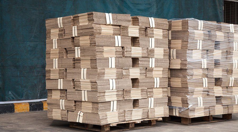 A pile of cardboard boxes stacked on top of each other