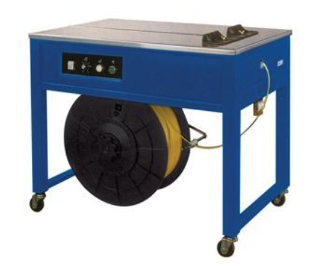 A blue table with a spool of tape on it