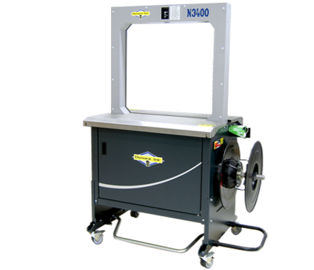 A machine is sitting on top of a cart on a white background.