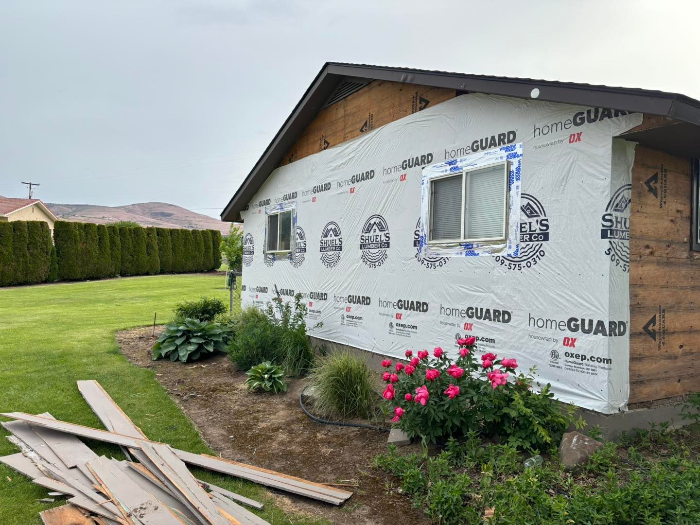 A house with a lot of insulation on the side of it.