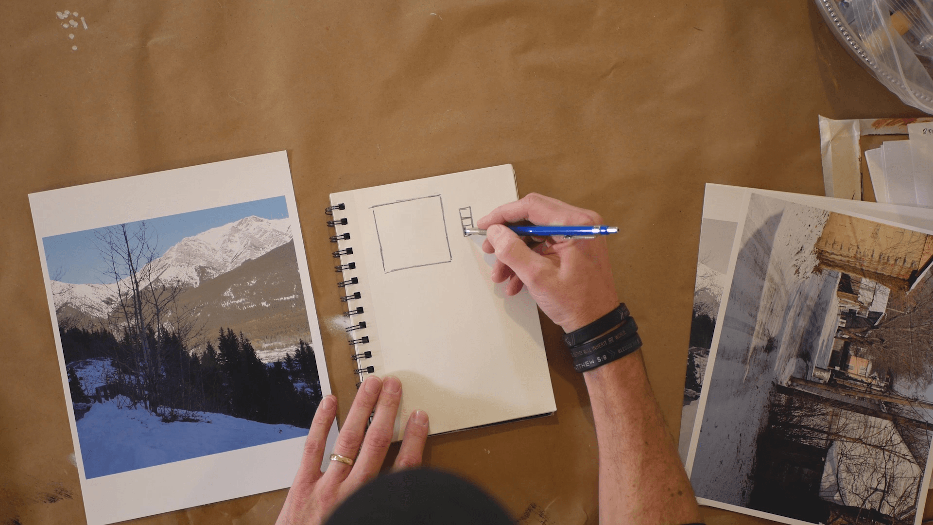 acrylic painter sketching a mountain