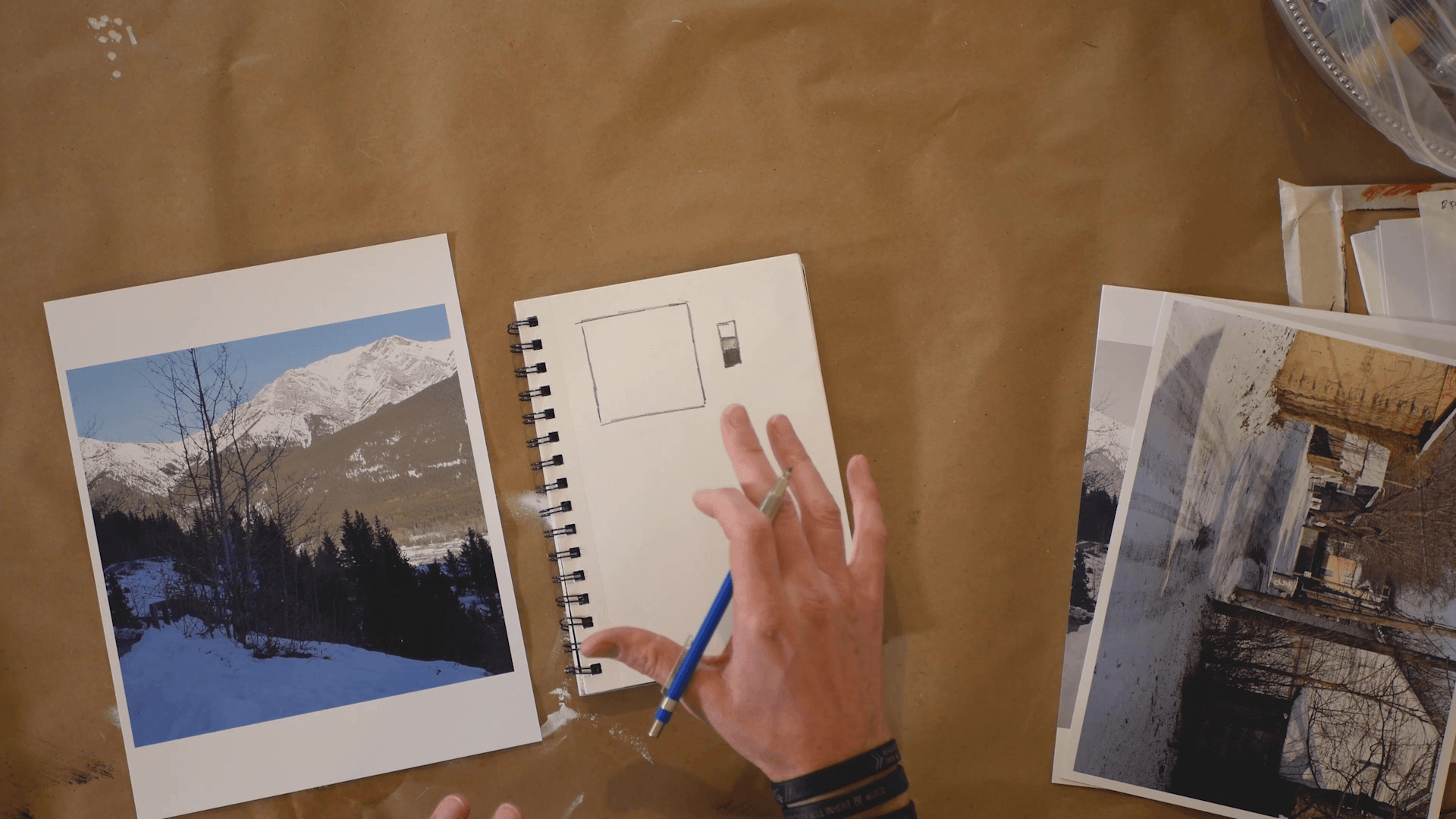 acrylic painter sketching a mountain