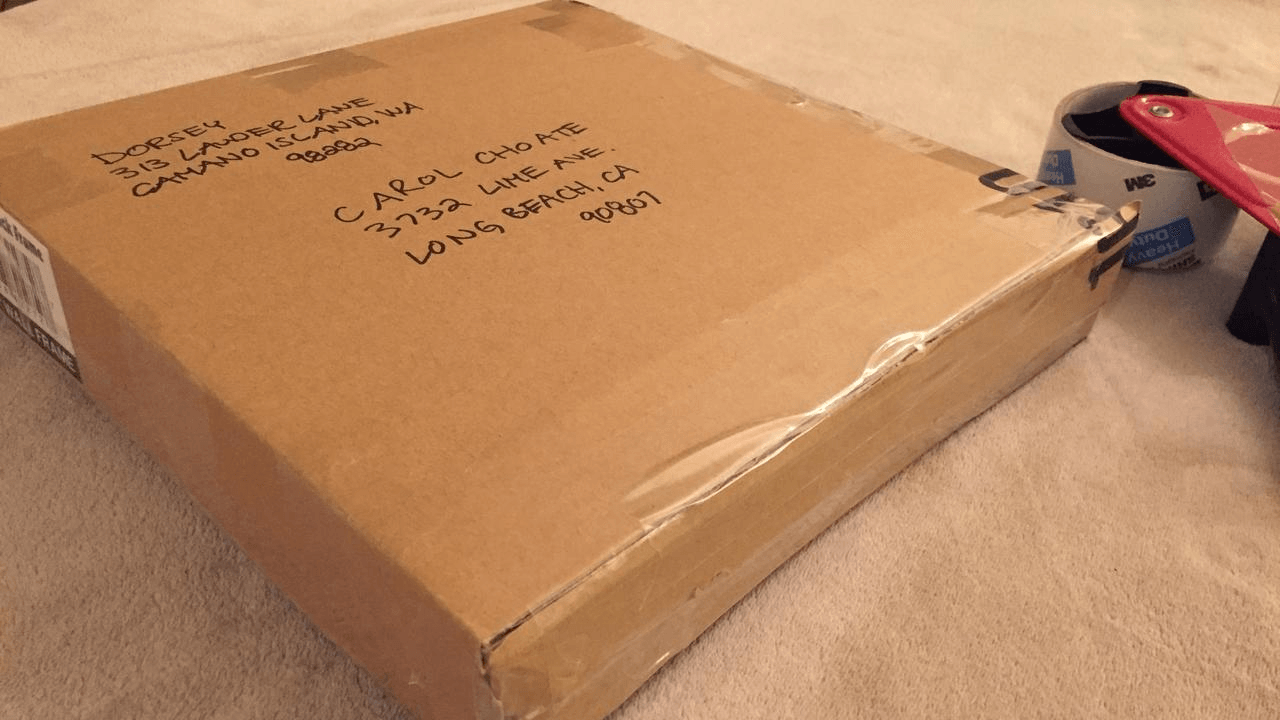 cardboard box secured with packaging tape