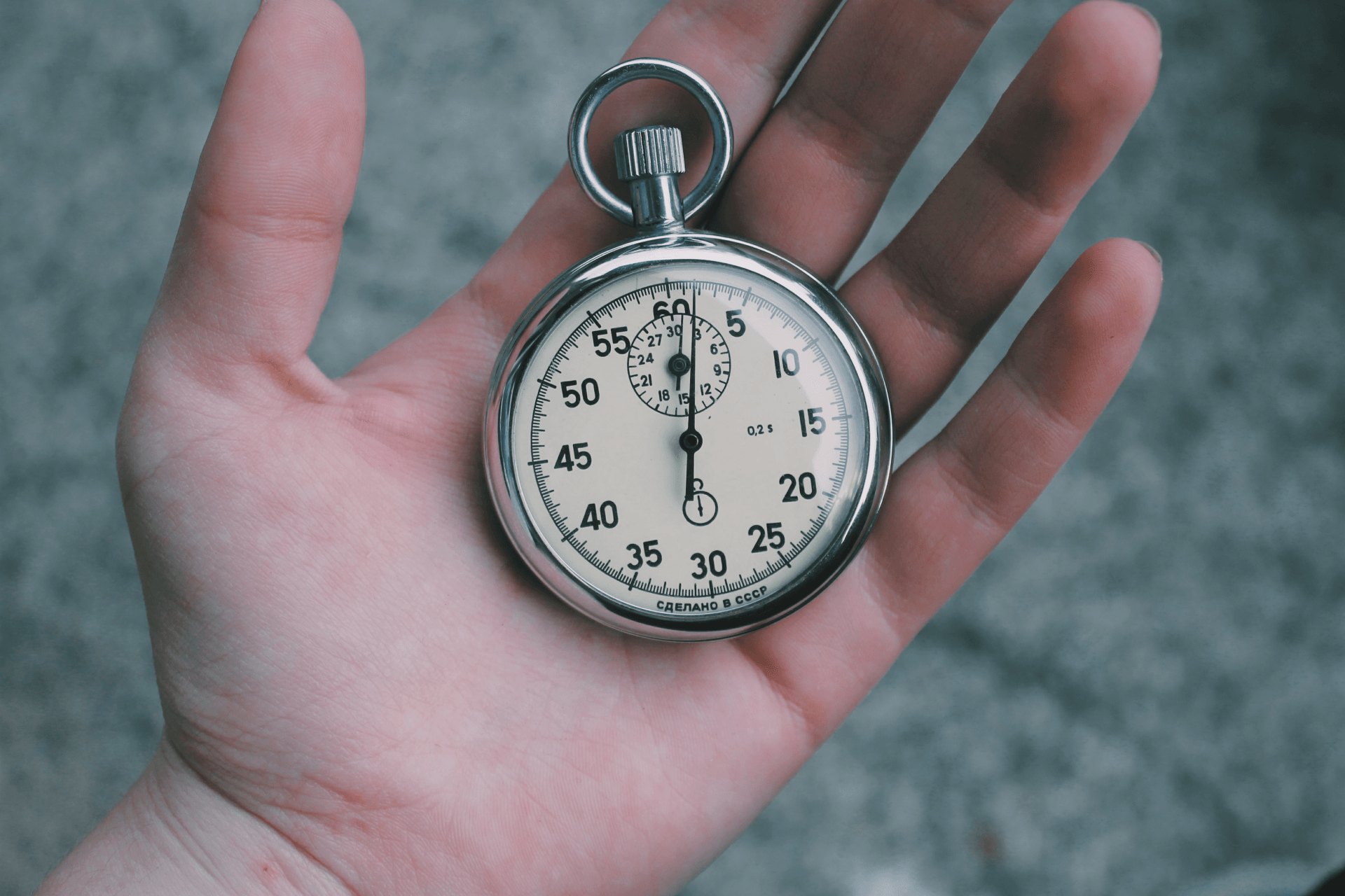 hand with pocket watch