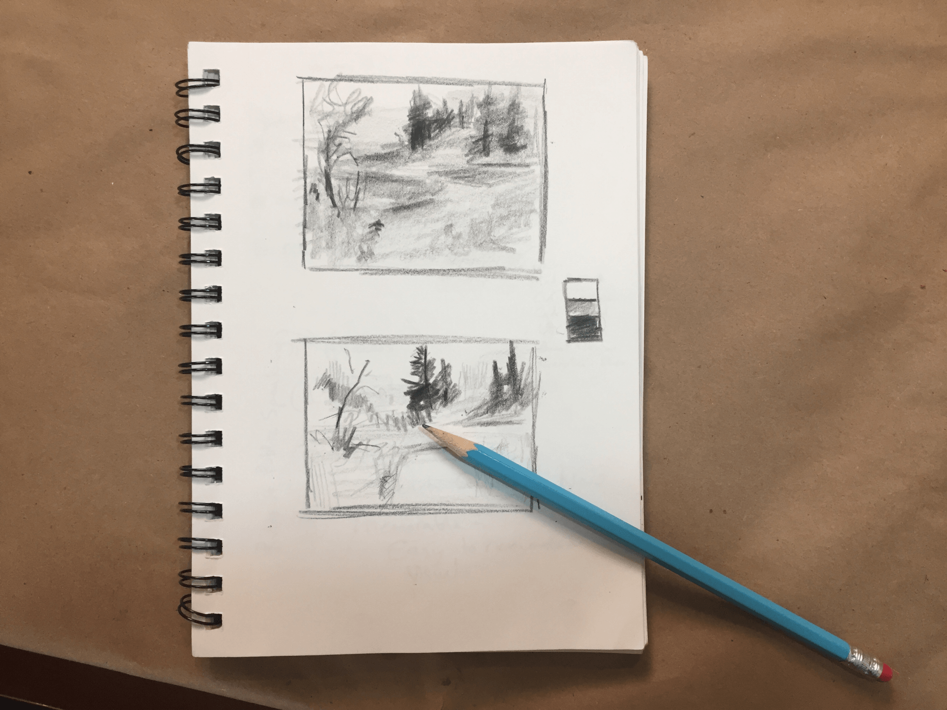sketchbook with blue pencil