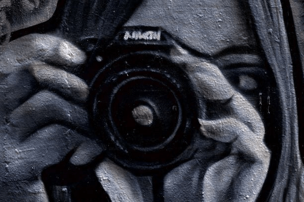 acrylic painting of a woman taking a picture from a nikon camera