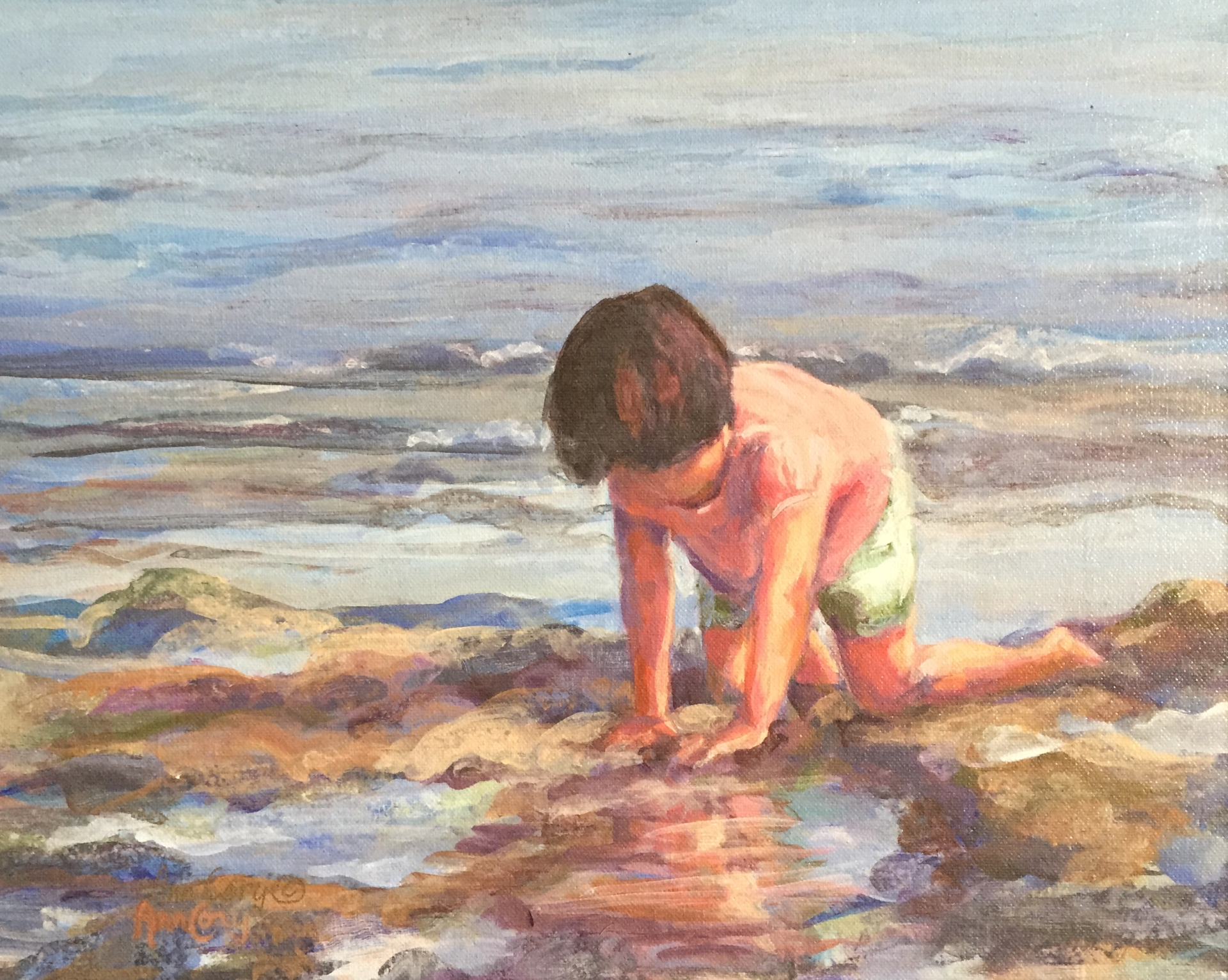 kid playing by the seashore
